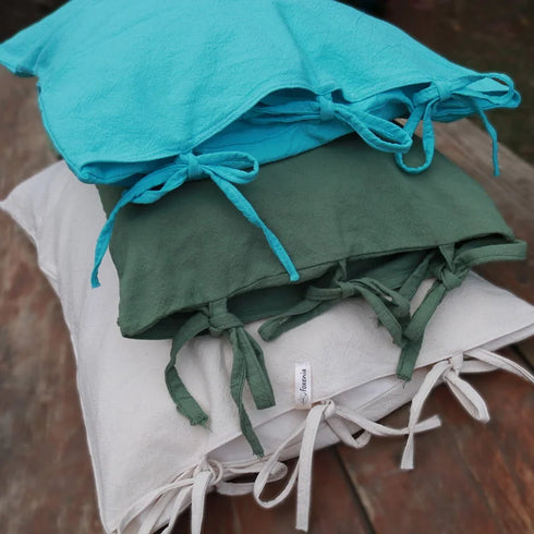 Long cushions with removable covers made of robust cotton house canvas